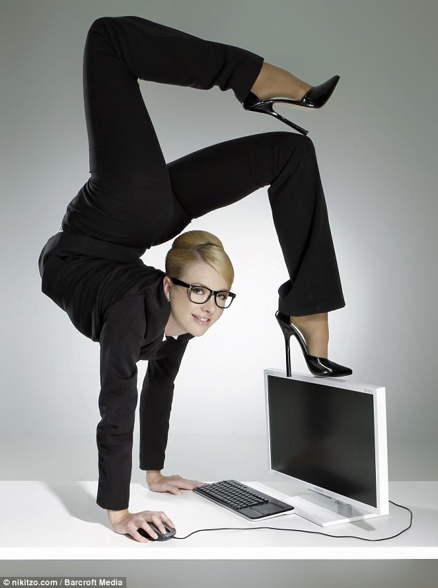 Think YOU are being overstretched in the office? Female contortionist brings new meaning to the term flexible working in incredible calendar shoot