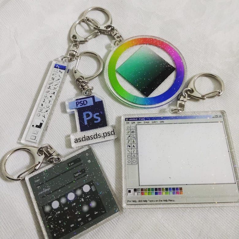 Designers, You’ll Love These $5 Keychains Of Popular Graphic Design Softwares And Memes